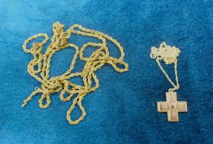 A 9CT GOLD CROSS PENDANT AND CHAIN