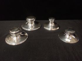 FOUR SILVER CAPSTAN INKWELLS