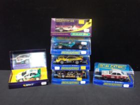 SIX SCALEXTRIC RACING AND RALLY CARS