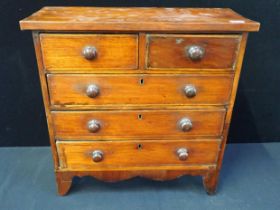 A VICTORIAN MAHOGANY MINIATURE CHEST OF DRAWERS