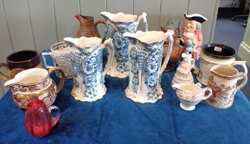 A SET OF THREE T.R. & Co Ltd 'VICTOR' GRADUATED JUGS