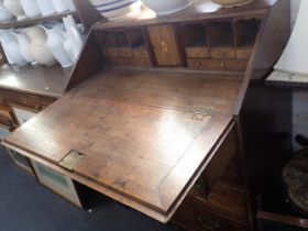 A GEORGE III PROVINCIAL OAK BUREAU