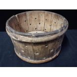 A 19TH CENTURY COOPERED PINE STRAINER OR COLANDER