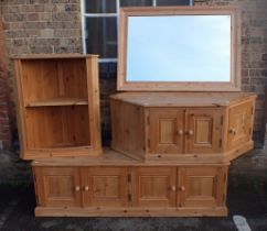 A LOW PINE FOUR DOOR CUPBOARD, A PINE GATELEG TABLE