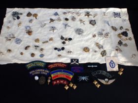 A COLLECTION OF MILITARY BADGES