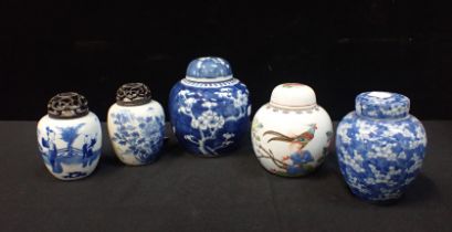 A COLLECTION OF GINGER JARS WITH COVERS