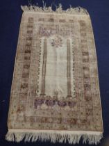 AN ANATOLIAN TURKISH COTTON AND SILK PRAYER RUG