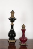 TWO SIMILAR GILT METAL MOUNTED CONVERTED OIL LAMPS