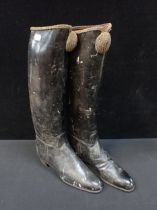 A PAIR OF RIDING BOOTS