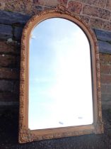 A VICTORIAN GILT WALL MIRROR