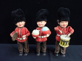 THREE WEST GERMAN CLOCKWORK MARCHING BANDSMEN