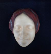 A CERAMIC WALL MASK; 'L'NCONNUE DE LA SEINE'