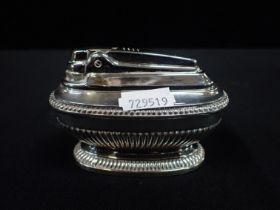 A RONSON 'QUEEN ANNE' SILVER PLATED LIGHTER