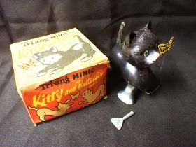A CLOCKWORK TRI-ANG MINIC KITTY AND BUTTERFLY TOY