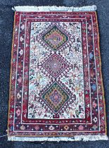 A SMALL QASHGAI SOUMAKH RUG