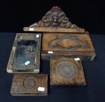 THREE CARVED WOODEN MOULDS