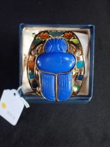 A 1970s EGYPTIAN STYLE BANGLE BY THOMAS FATTORINI Ltd