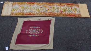 AN OLD EMBROIDERED PELMET, WITH ARMORIAL