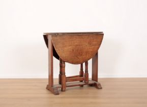 A WILLIAM AND MARY STYLE OAK GATE LEG TABLE