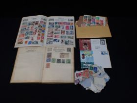 TWO STAMP ALBUMS AND A QUANTITY OF LOOSE STAMPS