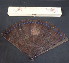 A CANTONESE PIERCED AND CARVED TORTOISESHELL FAN