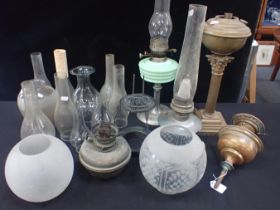 A COLLECTION OF OIL LAMPS