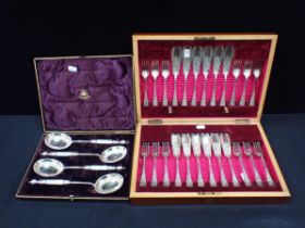 A BOXED SET OF HAMILTON & INCHES ORNAMENTAL SERVING SPOONS