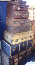 A VICTORIAN WOODEN-BOUND TRAVELLING TRUNK