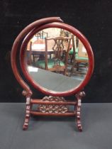 A CHINESE CARVED HARDWOOD TABLE MIRROR