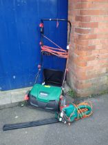 A QUALCAST ELECTRIC SCARIFIER AND RAKER