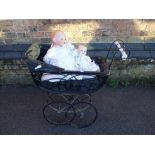 A VICTORIAN STYLE DOLL'S PRAM, AN A M GERMANY BISQUE HEAD DOLL