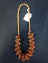 AN AMBER BEAD NECKLACE