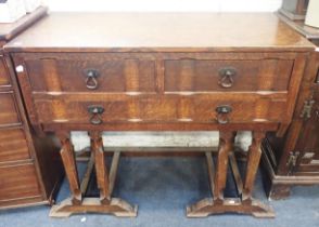 AN ARTS AND CRAFTS STYLE OAK SIDEBOARD