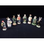 A COLLECTION OF BESWICK ECF COUNTRY FOLK FIGURES