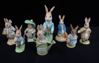 A COLLECTION OF BESWICK BESATRIX POTTER FIGURES