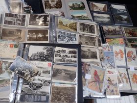 A VARIED COLLECTION OF POSTCARDS