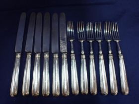 A MATCHED SILVER FRUIT EATING SET