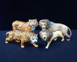 A COLLECTION OF BESWICK WILD CATS