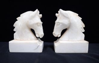 A PAIR OF ALABASTER HORSE'S HEAD BOOKENDS