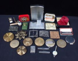 A COLLECTION OF POWDER COMPACTS AND CIGARETTE LIGHTERS