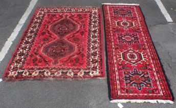 A RED GROUND HAMEDAN RUNNER