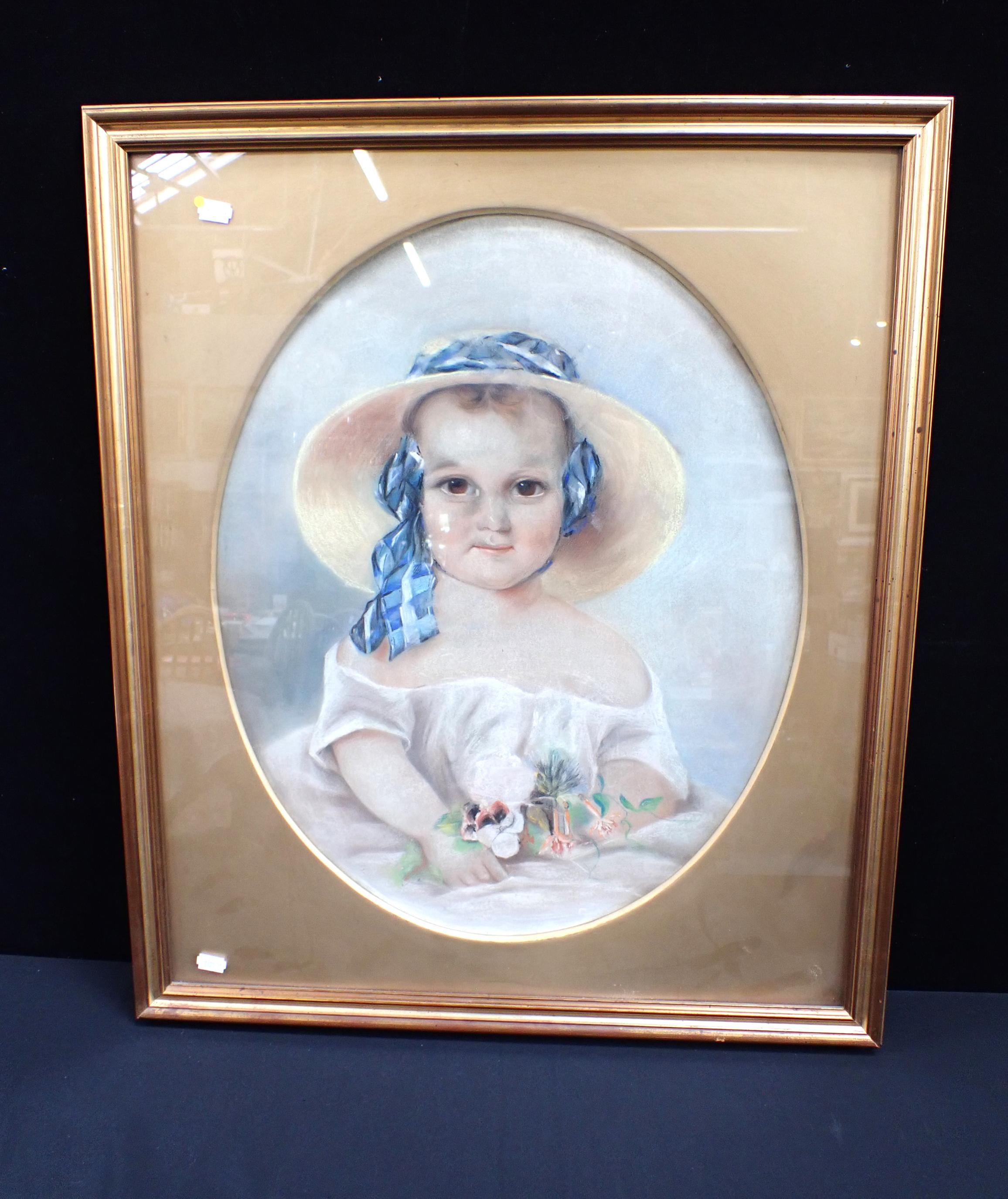 A LATE 19TH CENTURY PORTRAIT OF A CHILD, IN A BROAD STRAW HAT
