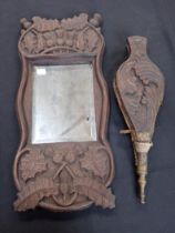 A SCOTTISH OAK FRAMED MIRROR, CARVED WITH THISTLES