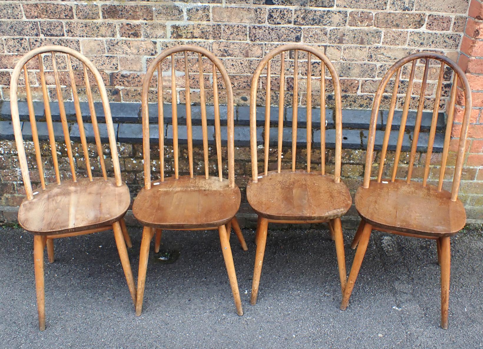 A SET OF FOUR ERCOL STYLE STICK-BACK CHAIRS