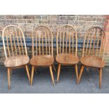 A SET OF FOUR ERCOL STYLE STICK-BACK CHAIRS