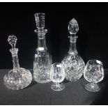 A WATERFORD DECANTER, OF MALLET SHAPE, AND GLASS