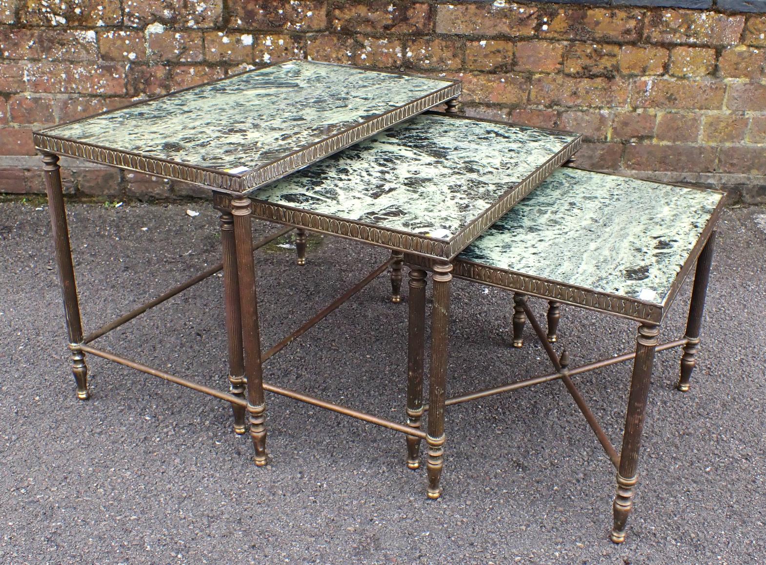 A NEST OF THREE TABLES IN THE STYLE OF MAISON BAGUES