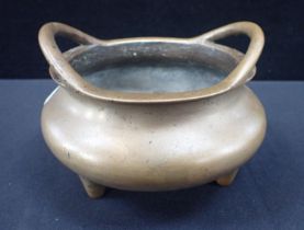 A CHINESE BRONZE THREE-FOOTED CENSER WITH XUODE MARK