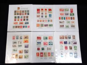 A FOLDER OF CHINESE STAMPS