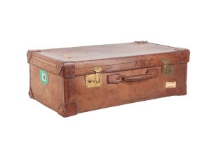 AN EDWARDIAN BROWN LEATHER SUITCASE